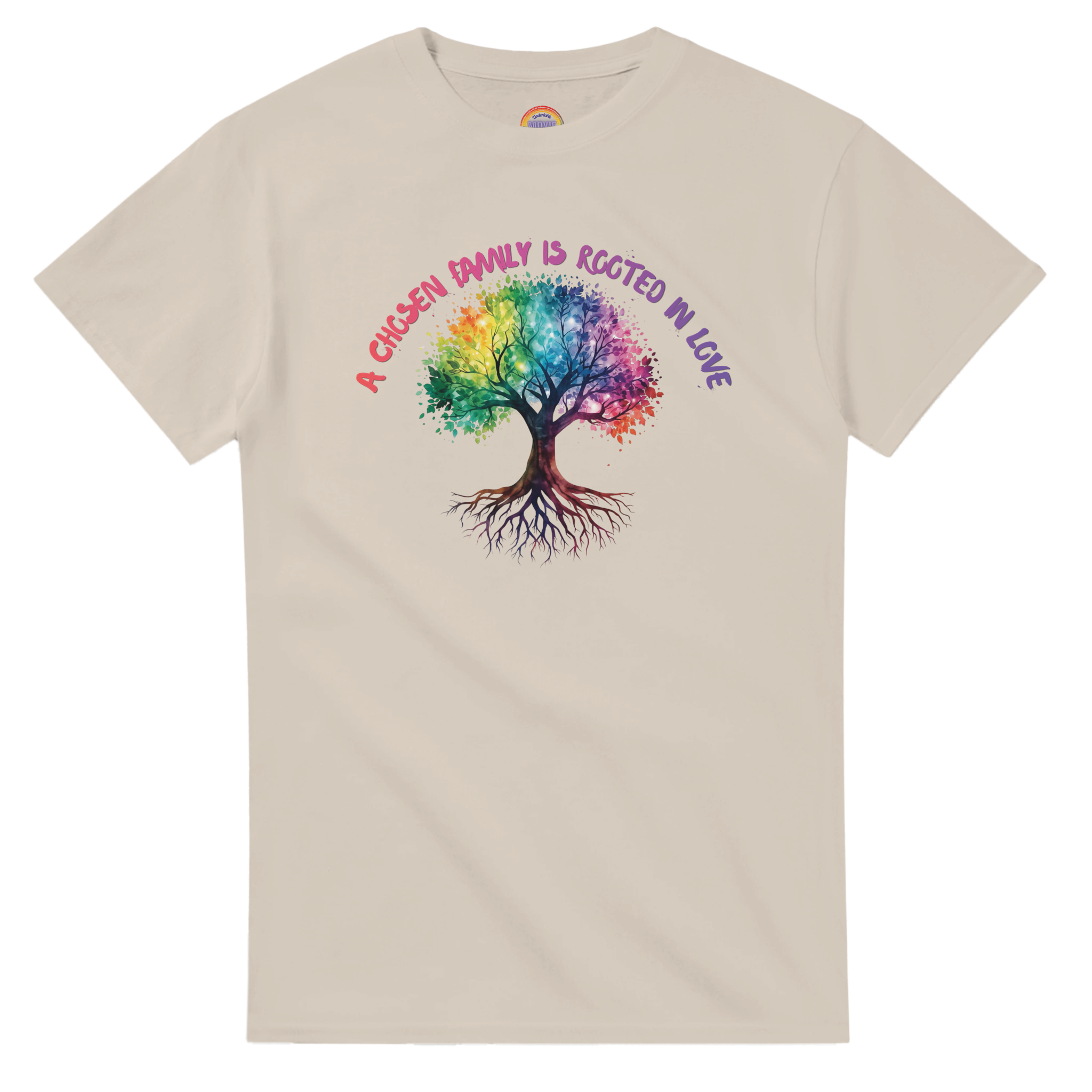 A sand colored t-shirt featuring a colorful graphic of a tree with a rainbow-colored canopy and roots, with the text 'A Chosen Family is Rooted in Love' arched above it in pink and purple lettering.