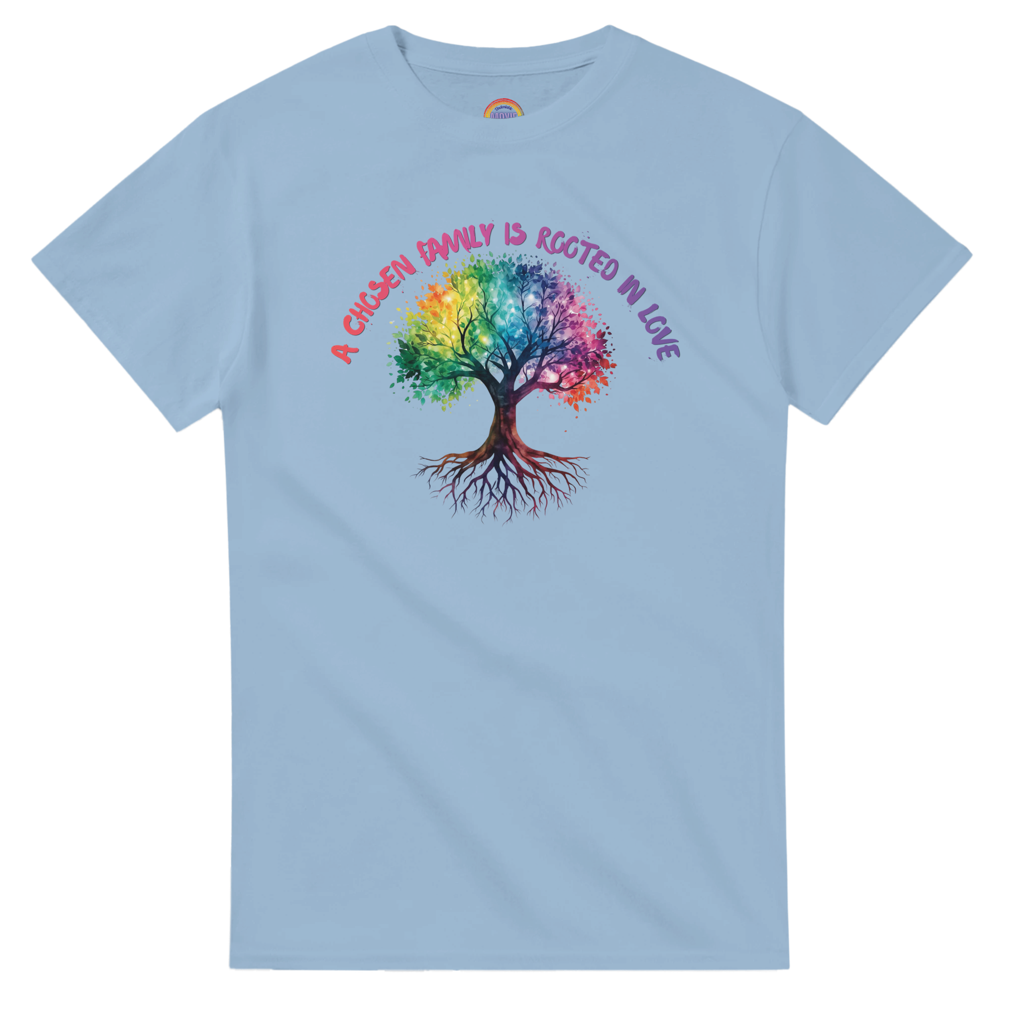 A Light Blue t-shirt featuring a colorful graphic of a tree with a rainbow-colored canopy and roots, with the text 'A Chosen Family is Rooted in Love' arched above it in pink and purple lettering.