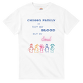 White t-shirt featuring a printed graphic with the text 'CHOSEN FAMILY IS NOT BY BLOOD BUT BY Soul' in blue and pink lettering, above five colorful hand-drawn stick figures.