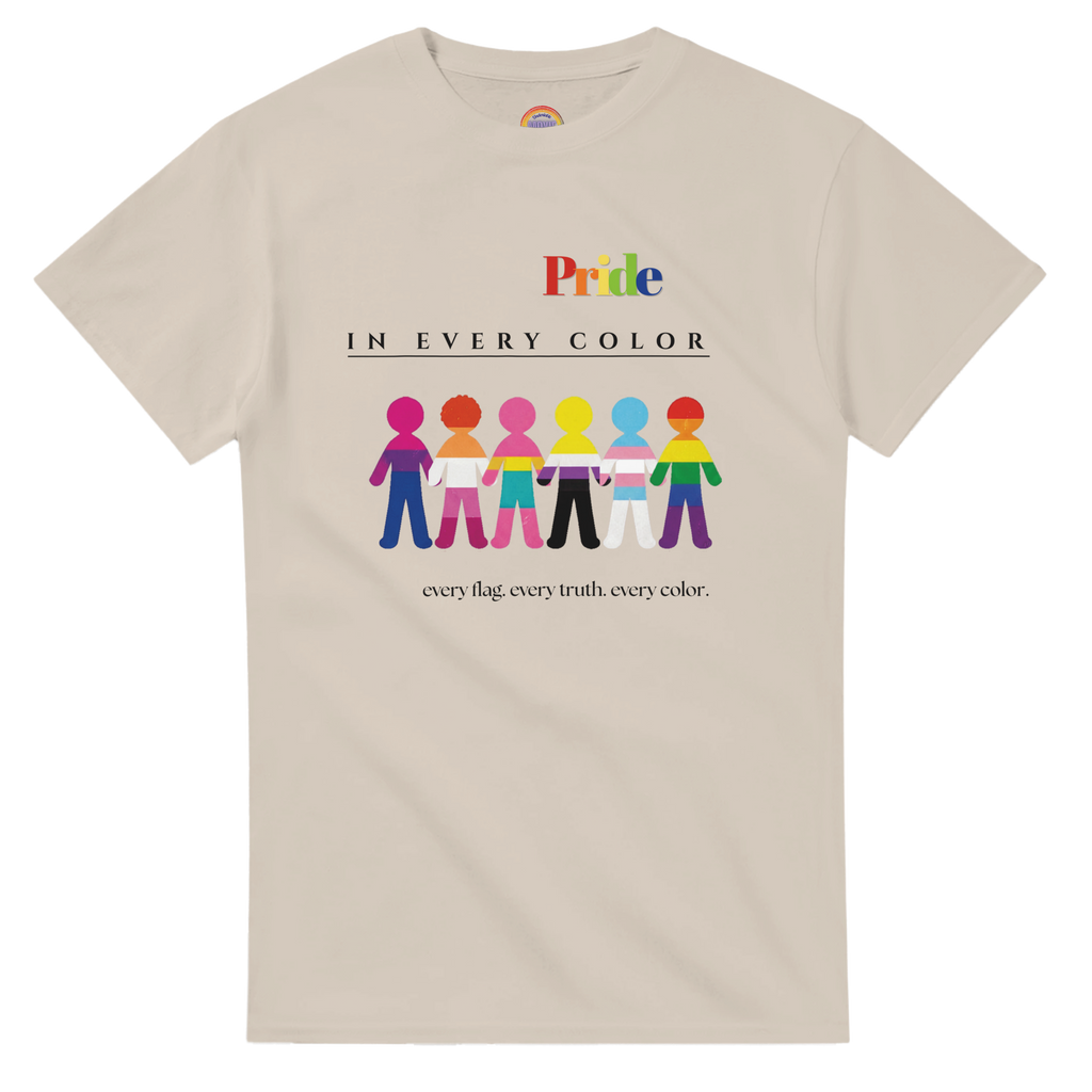Natural beige tee with a message Pride in Every Color followed by design of paper doll chain, each in a different pride flags colors.  Underneath is the wording, 'every flag. every truth. every color.