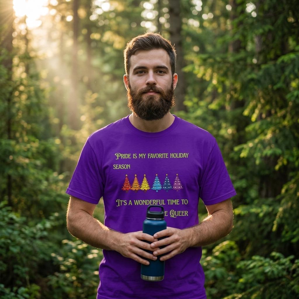 A man wearing a purple shirt with a row of rainbow colored Christmas trees with the words, "Pride is my favorite Holiday Season. It's a wonderful time to be queer".