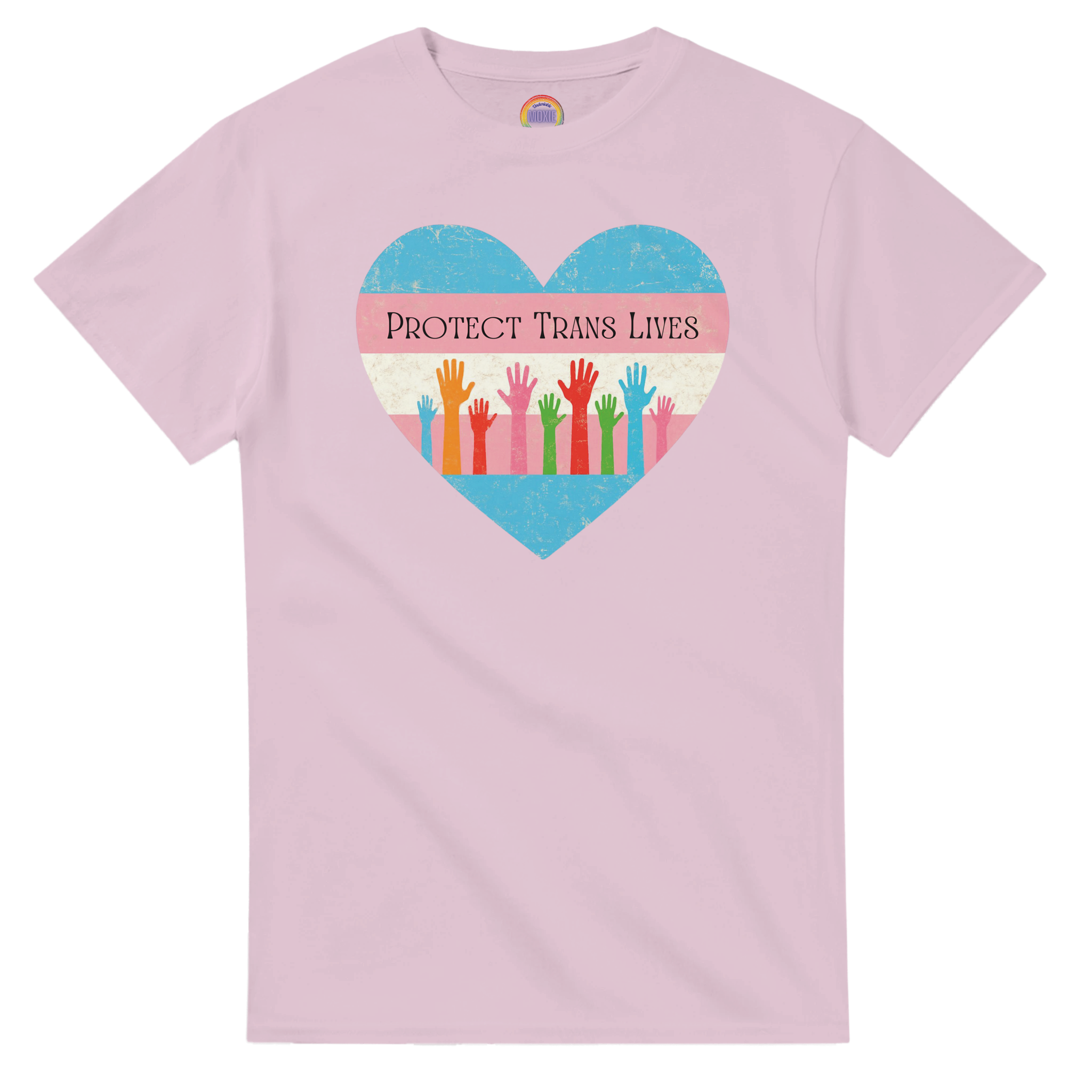 A graphic print on a light pink tee featuring a distressed heart design with the text 'PROTECT TRANS LIVES' and colorful raised hands in a transgender pride flag color scheme.