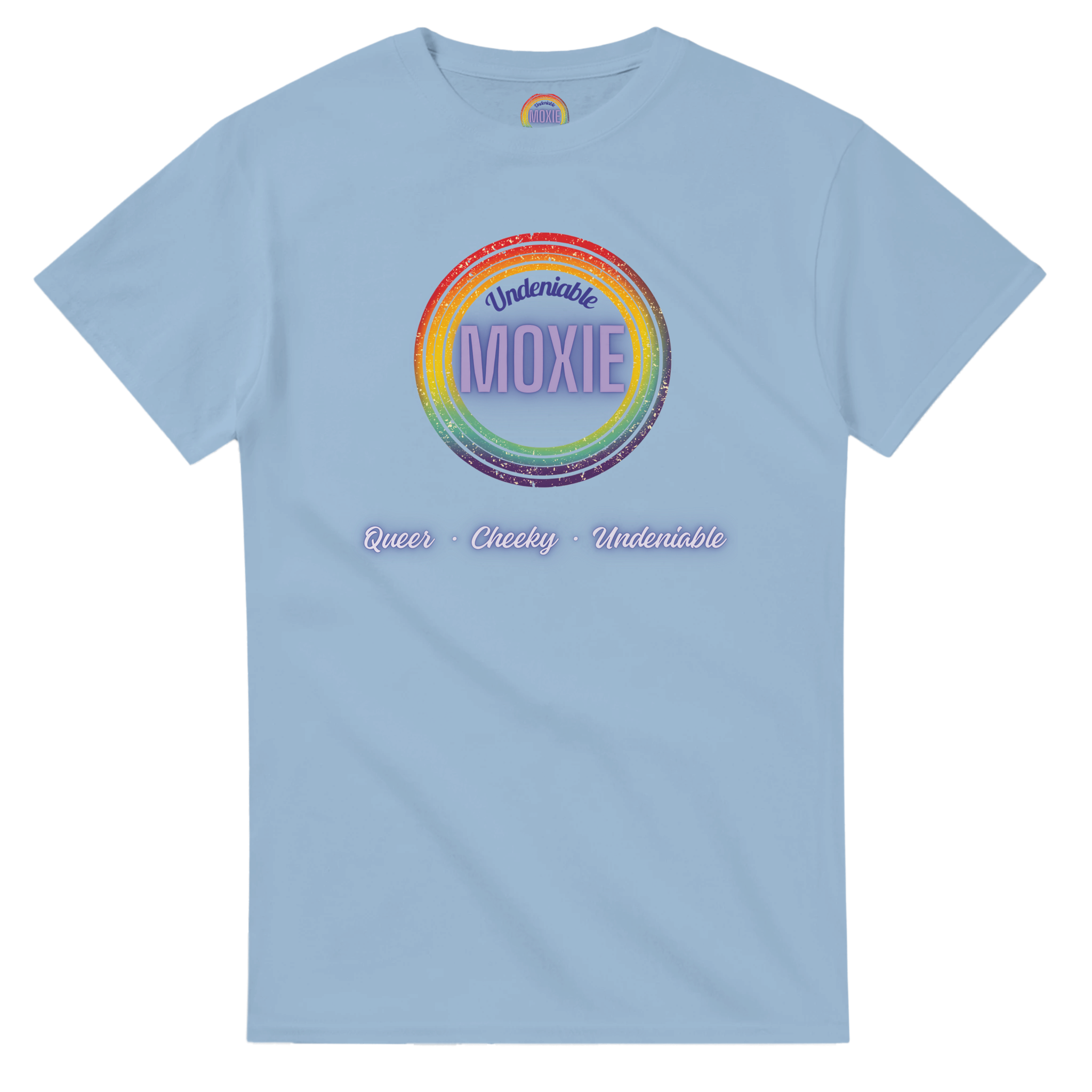 Graphic print on a light blue t-shirt featuring a circular rainbow design with the text 'Undeniable MOXIE' and 'Queer • Cheeky • Undeniable' written below in a stylized font.
