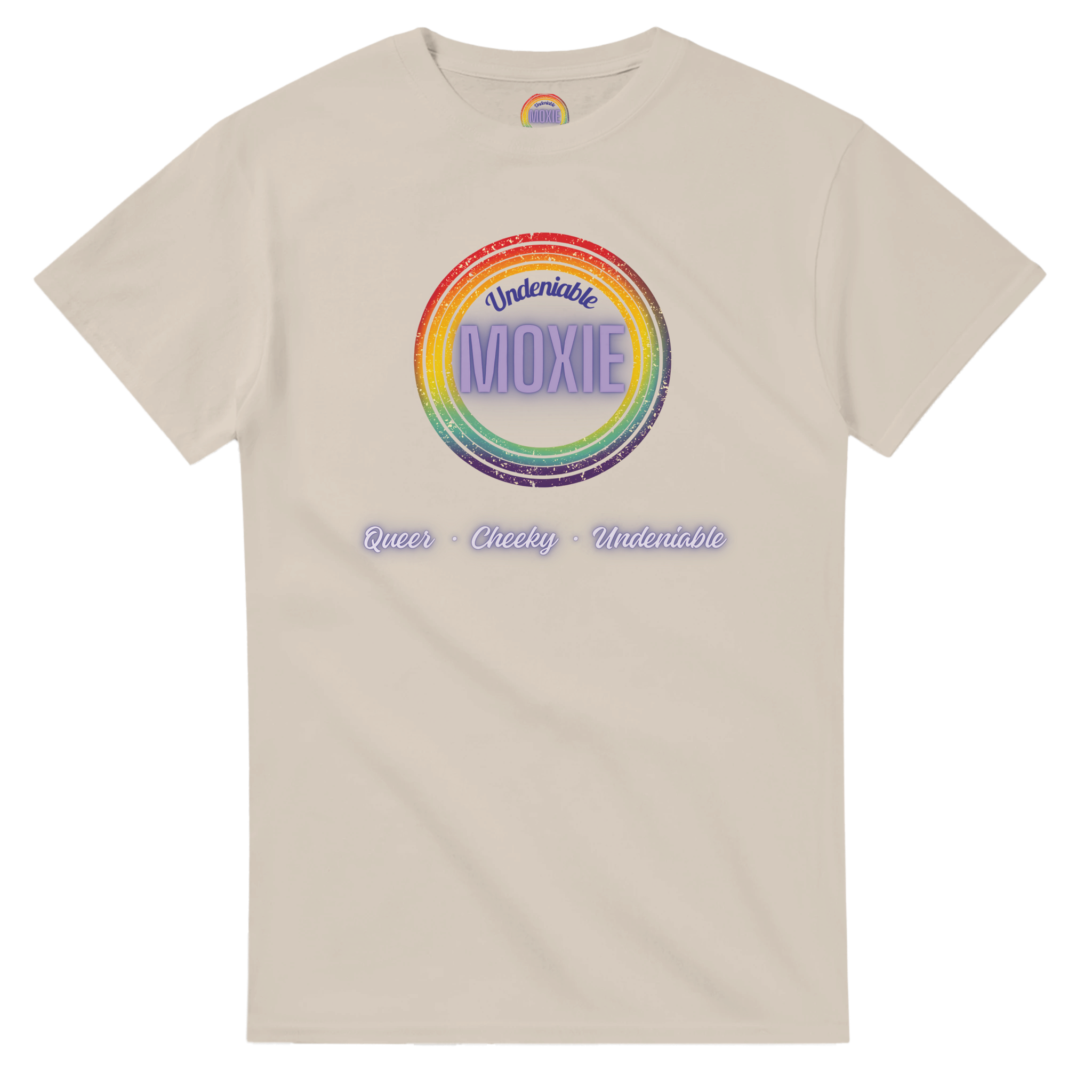 Graphic print on a sand colored t-shirt featuring a circular rainbow design with the text 'Undeniable MOXIE' and 'Queer • Cheeky • Undeniable' written below in a stylized font.