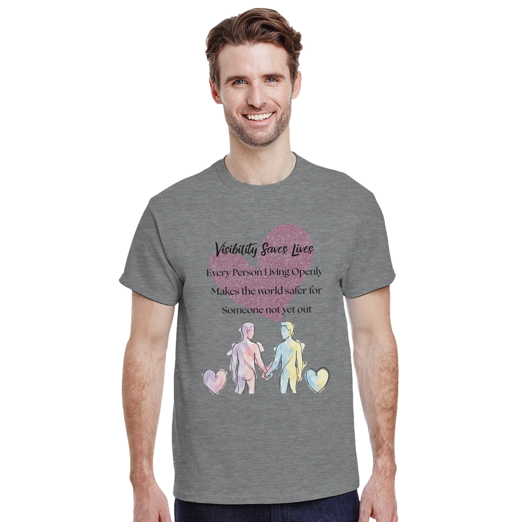 Man wearing a sport grey tee with a watercolor-style graphic on the front that reads 'Visibility Since Lives' and 'Every Person Living Openly Makes the world safer for Someone not yet out' with a graphic of 2 male presenting figures holding hands 