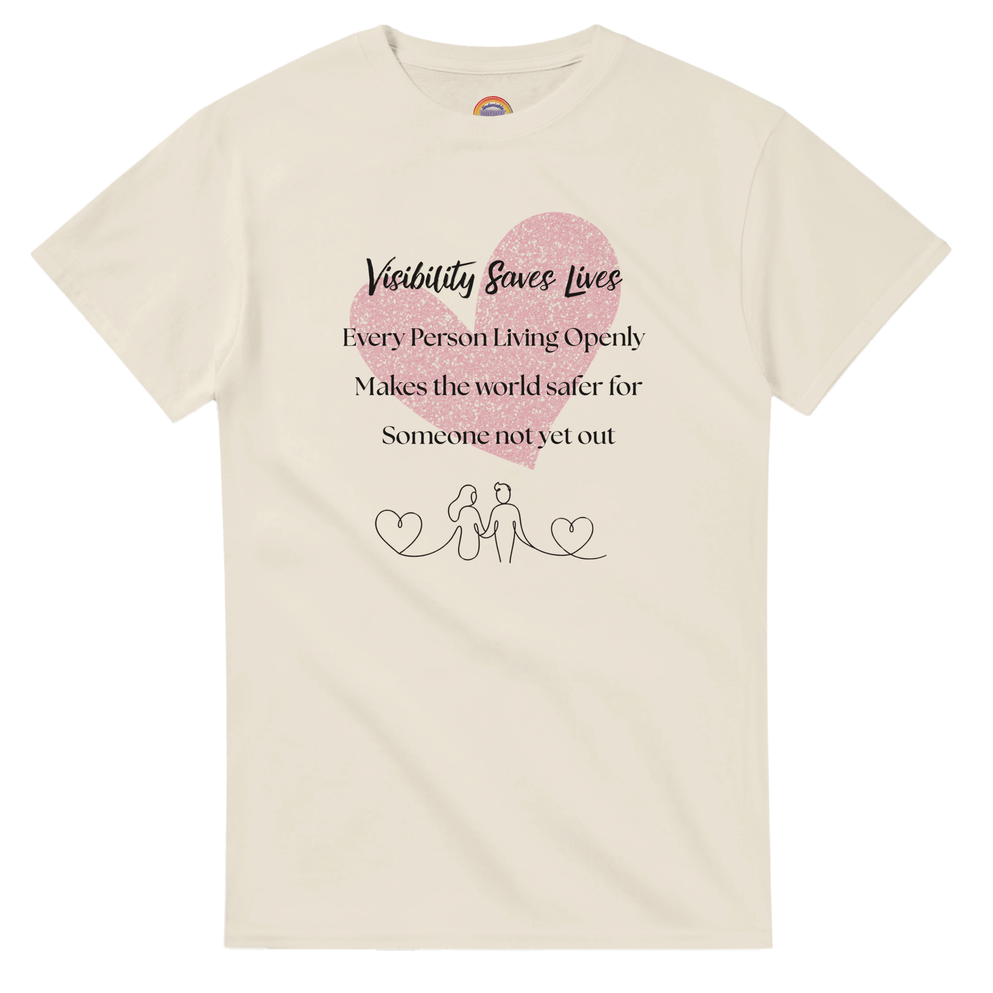 Natural beige crewneck tee with a watercolor-style graphic heart on the front. The shirt reads 'Visibility Saves Lives' and 'Every Person Living Openly Makes the world safer for Someone not yet out' with a line drawing graphic of 2 female presenting figures holding hands and hearts.